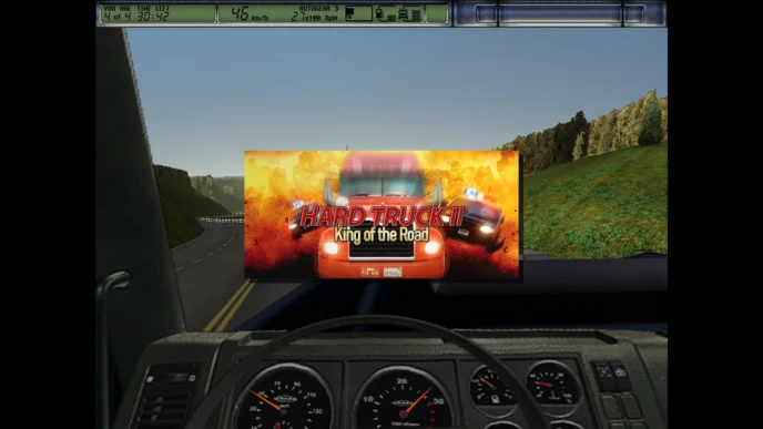 Vue intérieure de la cabine dans Hard Truck 2 King of the Road, avec tableau de bord réaliste, route sinueuse et logo officiel du jeu affiché à l'écran